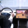 Сервіс Tesla Arcade допомагає "вбити" час під час зарядки