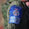 Боевики с повязкой СЦКК. Фото: из открытых источников