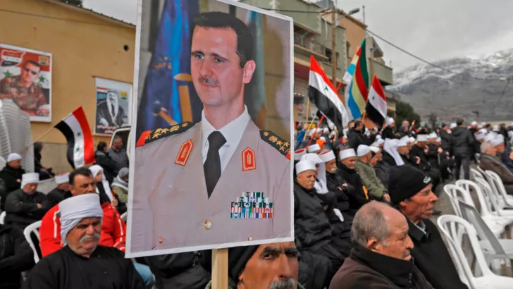 Сирийцы с портретом Башара Асада