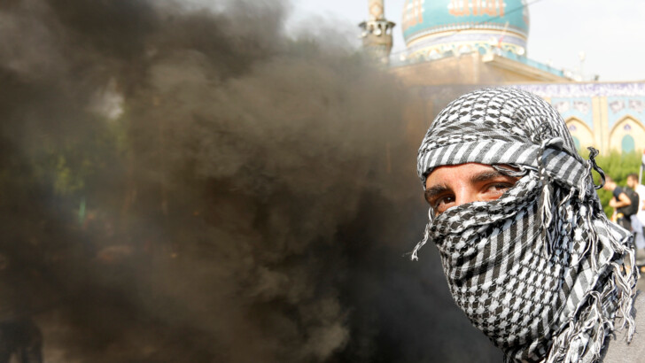 REUTERS/Ahmed Jadallah/Essam al-Sudani/Khalid al-Mousily