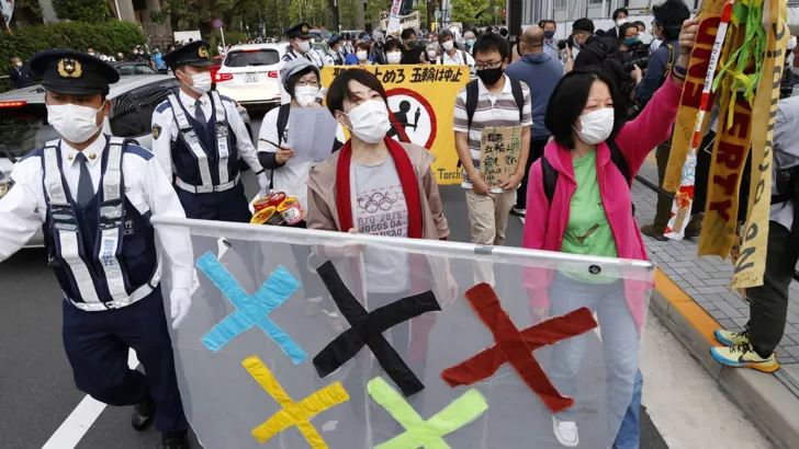 Жителі Японії проти Олімпійських ігор. Фото: Kyodo. Kyodo/via REUTERS