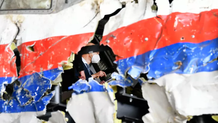 Уничтожение самолета рейса MH17 над Донбассом, фото: REUTERS/Piroschka van de Wouw