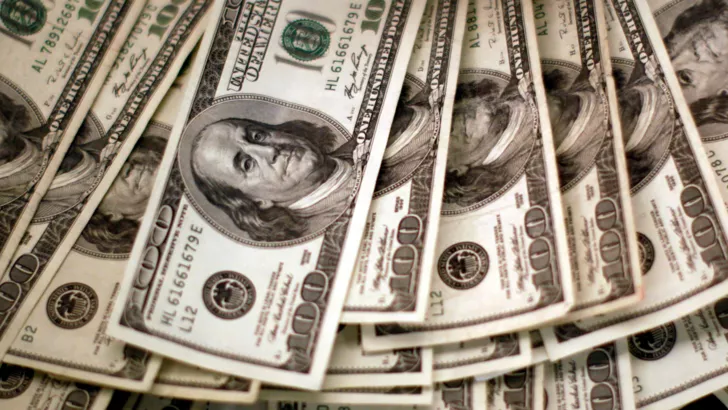 Доллар продолжает плавное снижение/ Фото: REUTERS/Rick Wilking