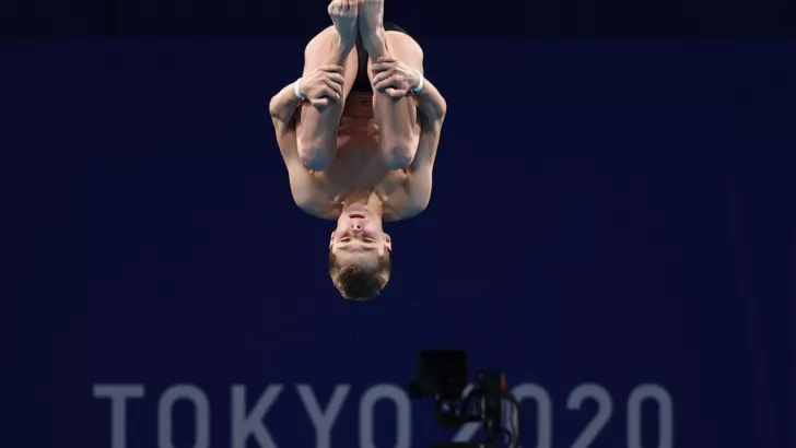 Олексій Середа стрибає в Токіо