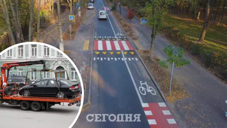 В Киеве десятки авто переставили эвакуатором на велодорожку
