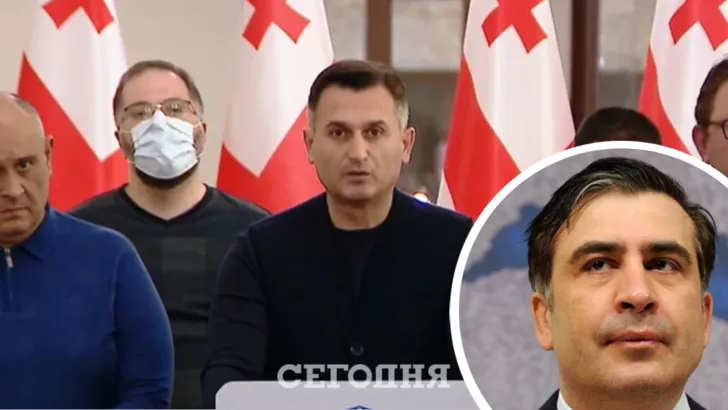 Давид Киркитадзе (за трибуной) и другие депутаты, объявившие голодовку в поддержку Михеила Саакашвили. Фото: коллаж "Сегодня"
