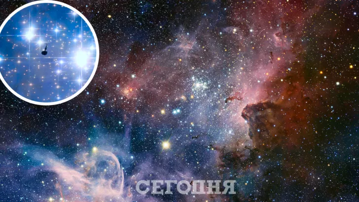 Астрономы показали снимок звездного скопления с кляксой внутри