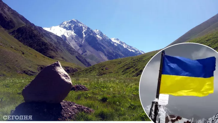 На пике Путина — флаг Украины