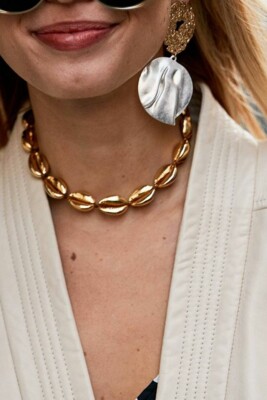Ожерелье из ракушек, покрытое золотом | Фото: Pinterest