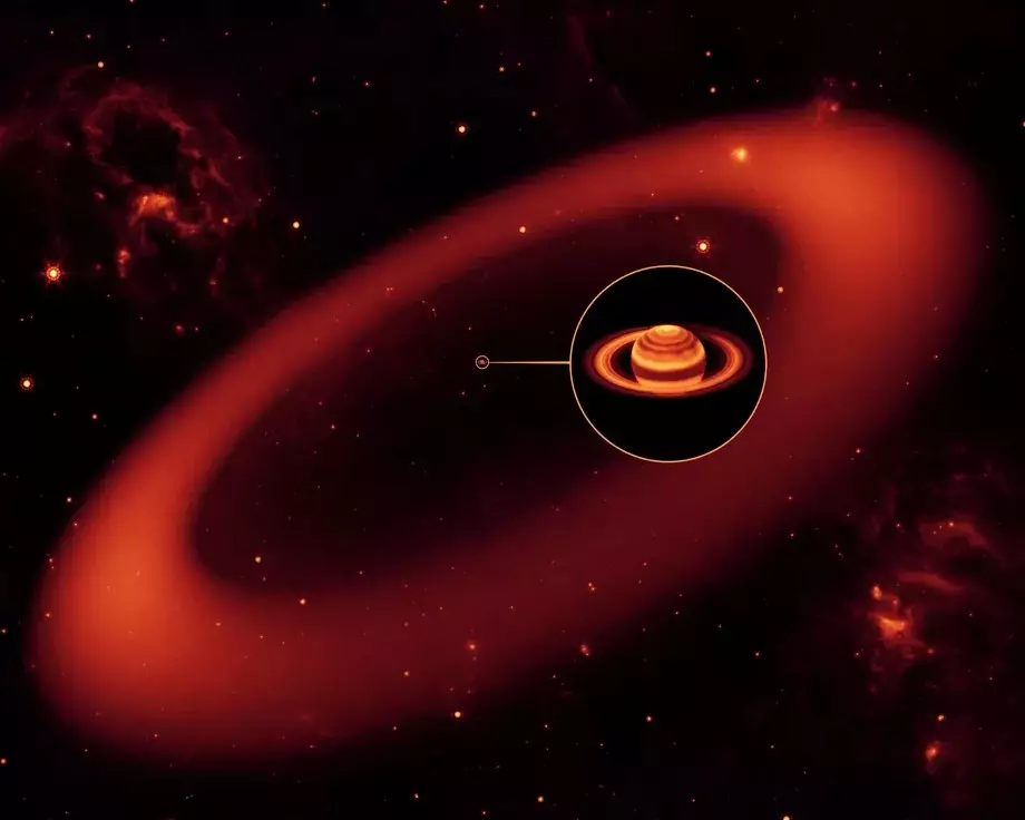 Художественное изображение невидимого кольца Сатурна, открытого "Спитцером"