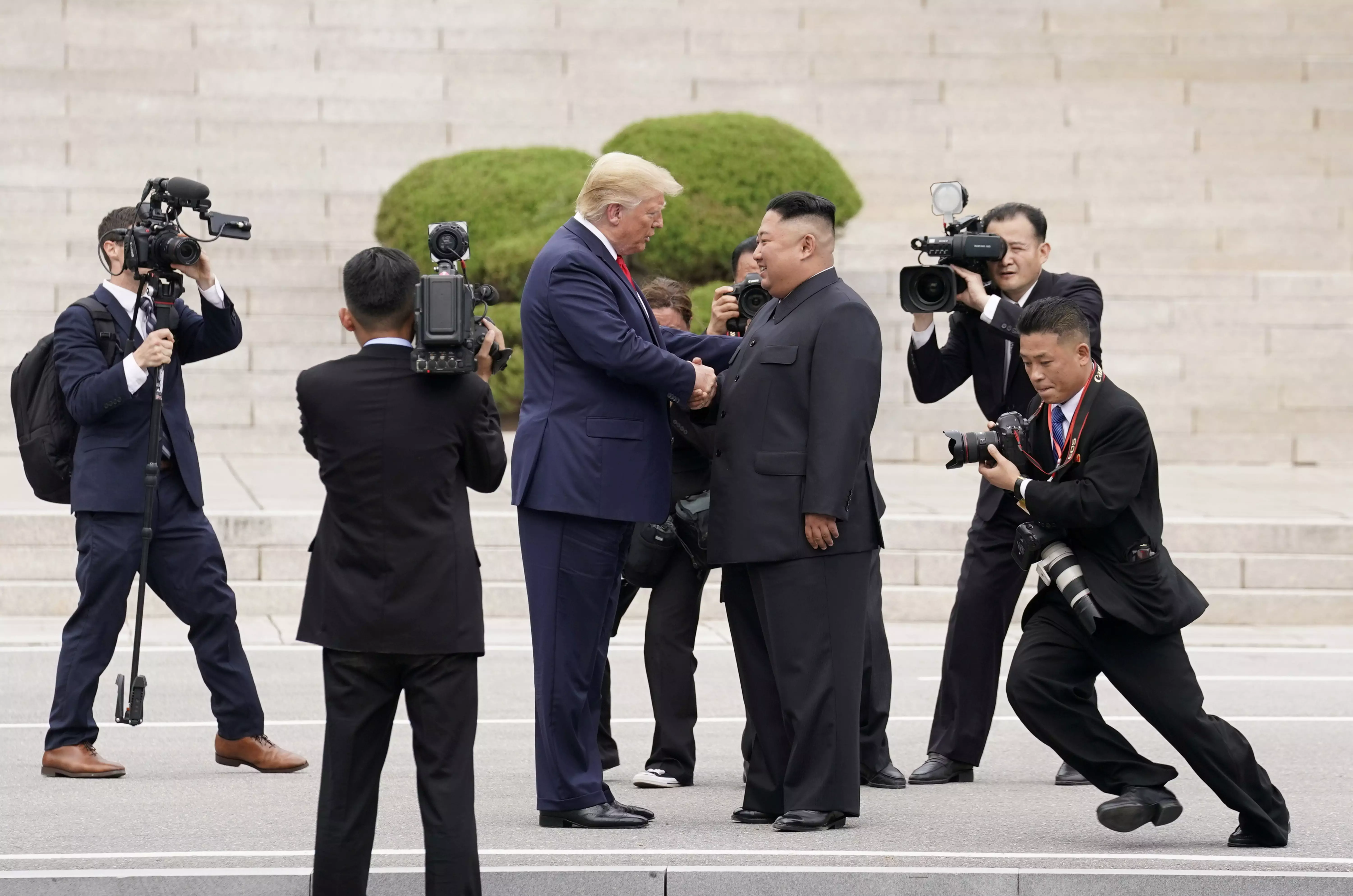 Дональд Трамп и Ким Чен Ын. Фото: REUTERS/Kevin Lamarque