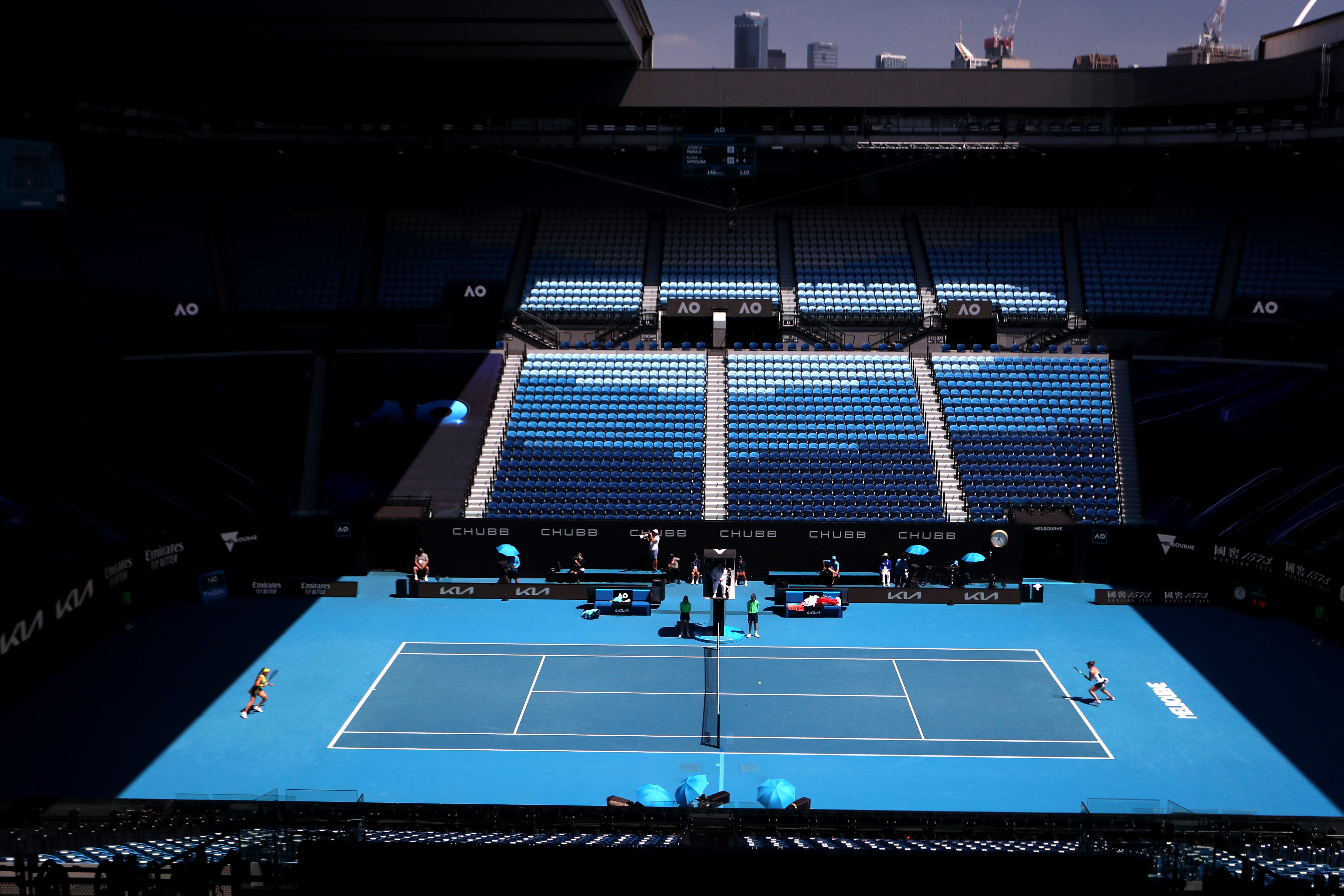 	Как выглядит матч Australian Open без зрителей. Фоторепортаж из Мельбурна