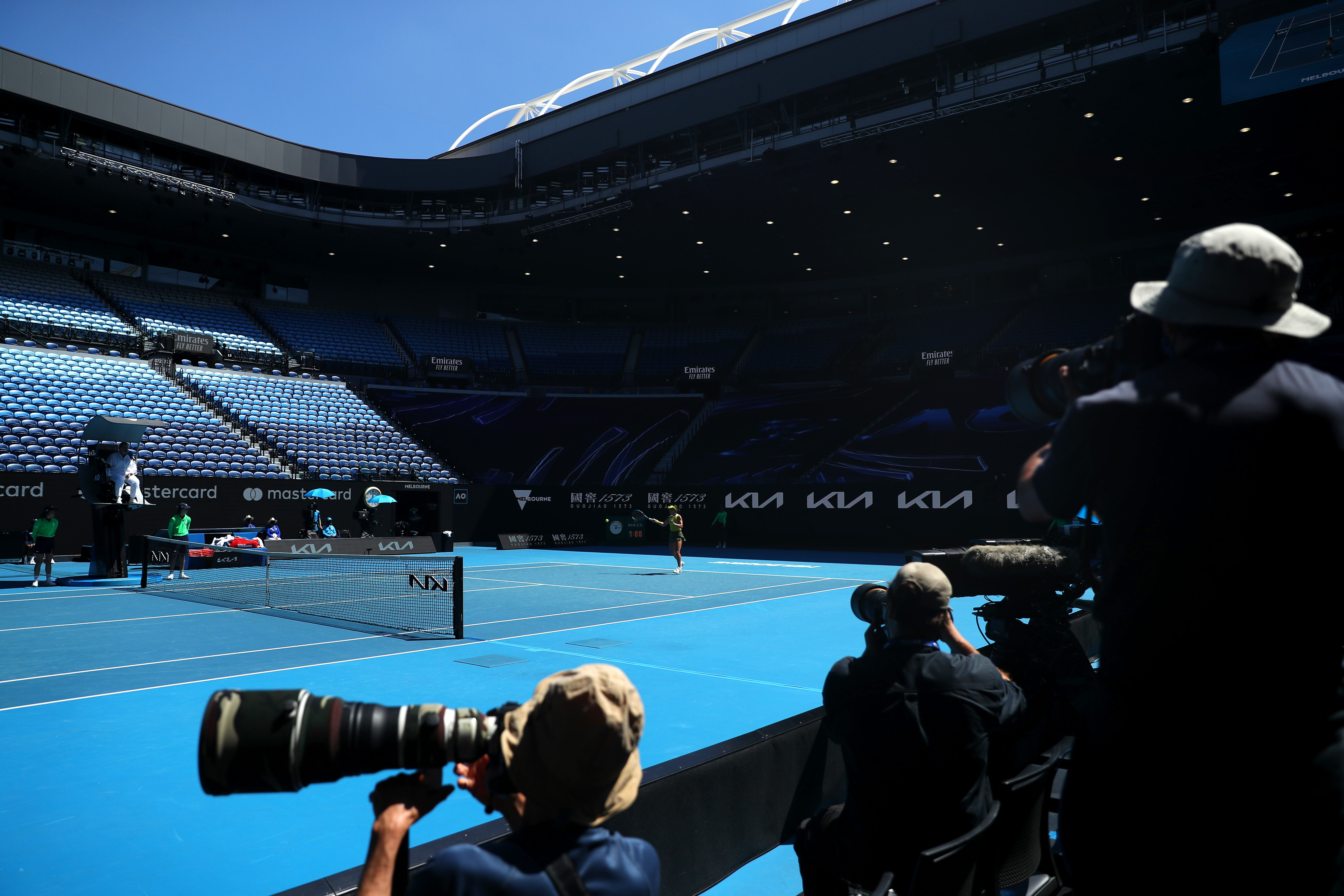 	Как выглядит матч Australian Open без зрителей. Фоторепортаж из Мельбурна