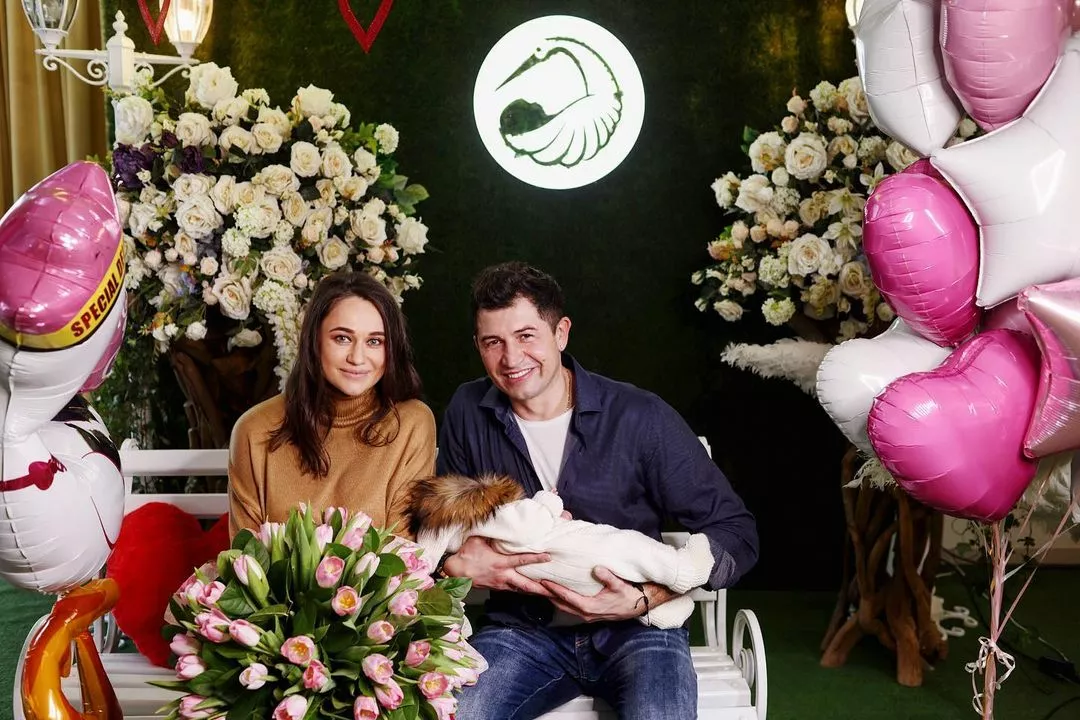 Юлия Леус и Андрей Джеджула с новорожденной дочкой
