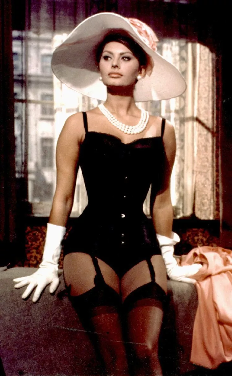 Кадр из фильма "Миллионерша" 1960 г