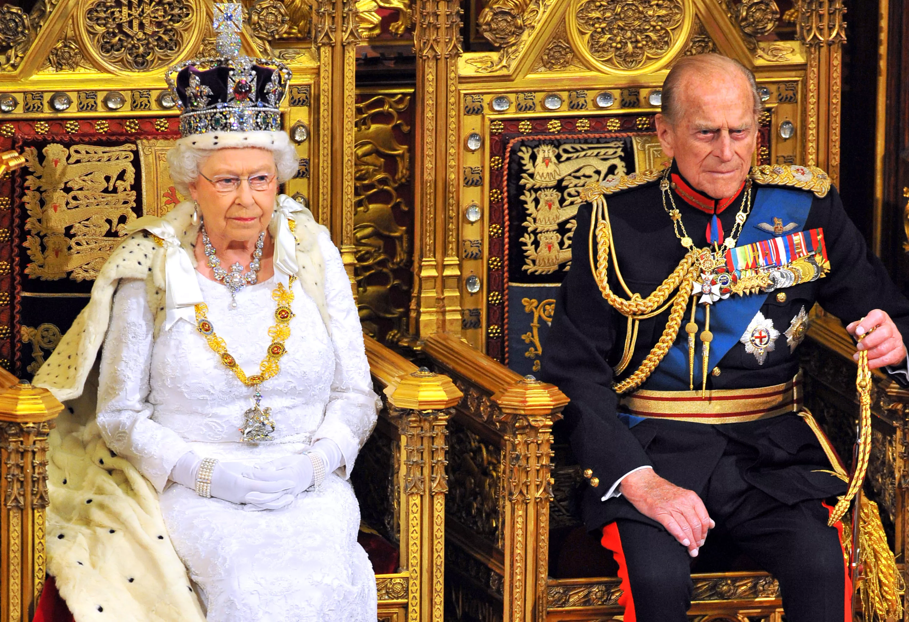 Королева Елизавета II с принцем Филиппом в Вестминстерском дворце 4 июня 2014 года.