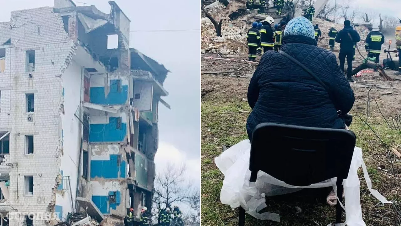Женщина из Бородянки смотрит, как спасатели разбирают завалы, под которыми осталась ее семья
