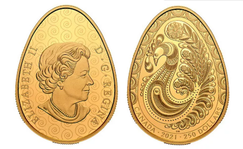Портрет Елизавета II на монете в форме украинской писанки
