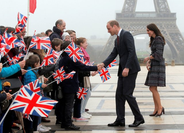 <p>Кейт Міддлтон і принц Вільям в Парижі. Фото: AFP</p>