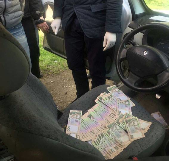 В Днепропетровской области на взятке погорели депутаты. Фото: полиция