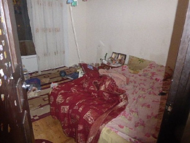 Женщина жила с телом матери. Фото: ГУ НП в Киеве