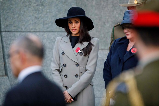Меган и Гарри приняли участие в церемонии памяти военнослужащих | Фото: Фото: AFP