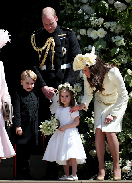Кейт Міддлтон і приц Вільям з дітьми Джорджем і Шарлоттою на весіллі принца Гаррі та Меган Маркл | Фото: Фото:  Getty