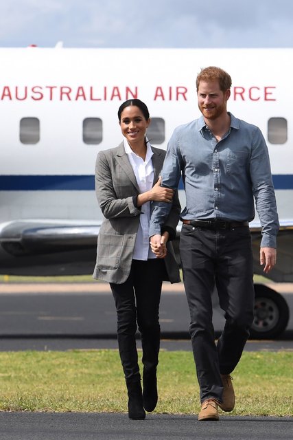 Меган Маркл і принц Гаррі в Австралії. | Фото: Фото: AFP