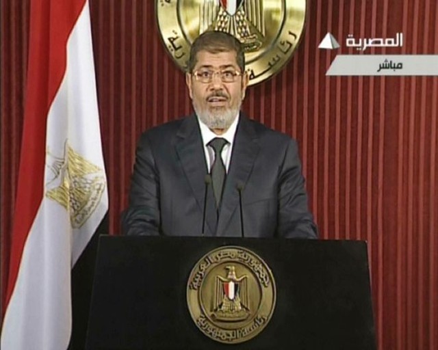 Мурси. Ему бы ночь простоять... Фото AFP