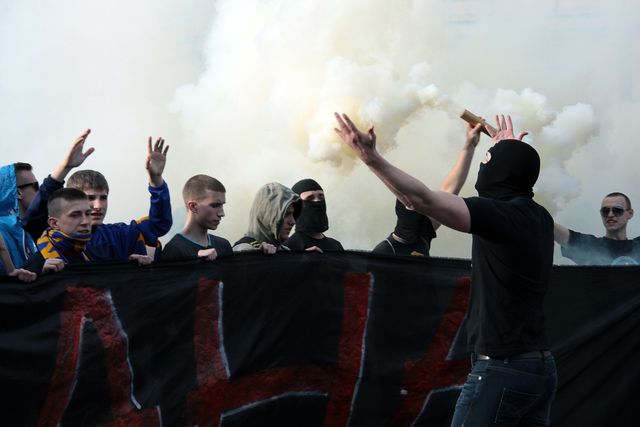 <p>У Харкові на марш "за єдність" напали люди з георгіївськими стрічками, фото AFP</p>