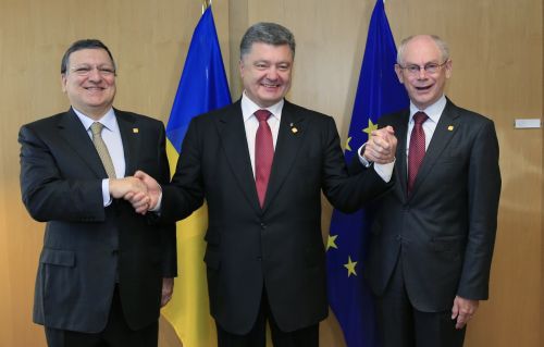Економічна частина Угоди про асоціацію між Україною та ЄС підписана. Сторони щасливі, але Україні належить зробити ще дуже багато чого, щоб реально наблизити свою економіку до європейської. Фото AFP