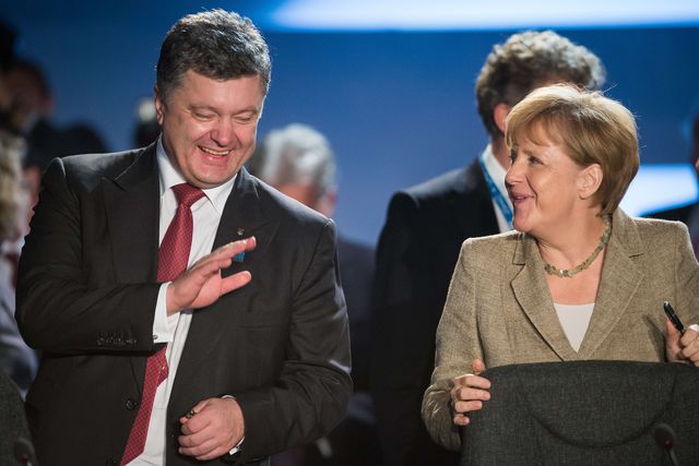 Петр Порошенко и Ангела Меркель. Фото: AFP