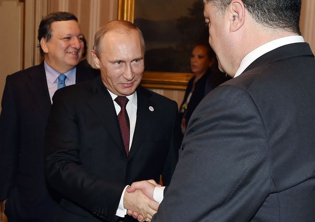 Путін і Порошенко. Фото: AFP