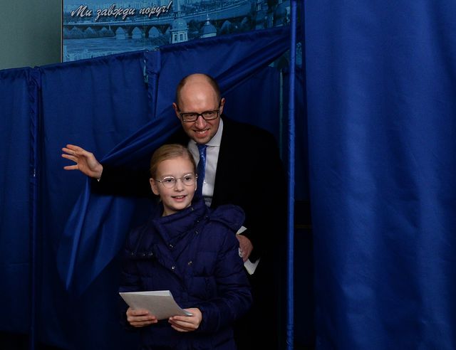Арсений Яценюк с дочерью. Фото: AFP