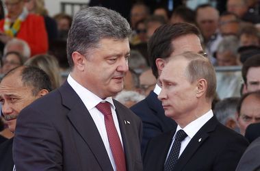 Петро Порошенко та Володимир Путін. Фото: AFP