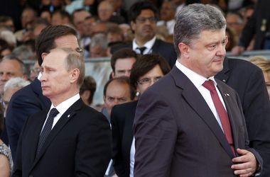 Путін і Порошенко в Мінську. Фото: AFP