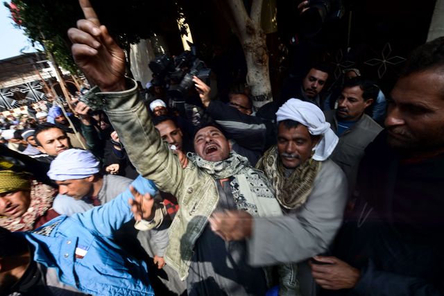 Группировка ИГИЛ разместила в Сети видео, на котором показана казнь 21 египетского рыбака в Ливии. Все они являлись христианами-коптами. Президент Египта Абдельфаттах ас-Сиси заявил, что страна оставляет за собой право реагировать, как посчитает нужным на убийство соотечественников исламистами в Ливии. Фото: AFP