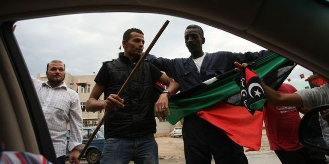 9 октября 2011 года. Ливия. Через несколько недель во время штурма города Сирт был тяжело ранен, а затем убит бывший лидер страны Муаммар Каддафи