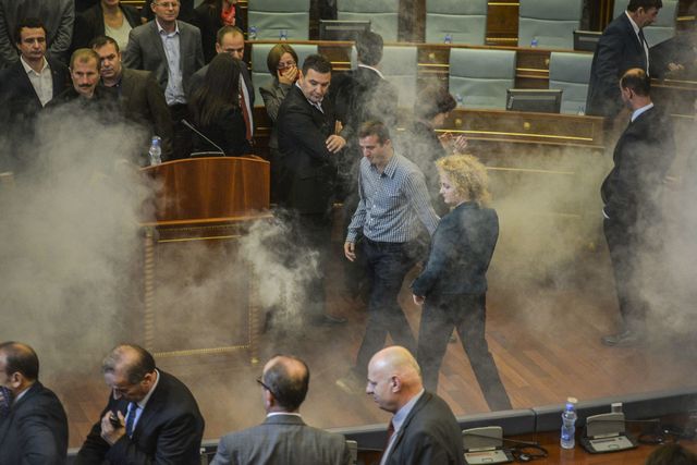 <p>Під час засідання в зал було кинуто гранату зі сльозогінним газом. Фото: AFP</p>