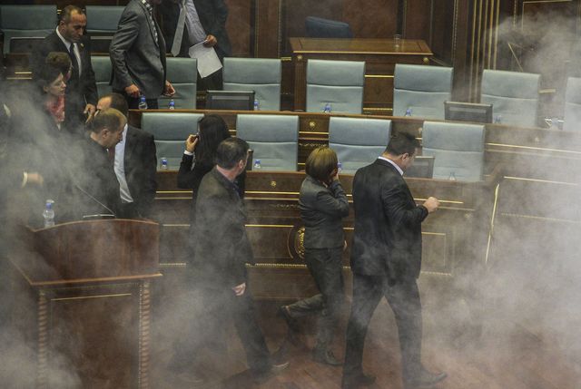 <p>Під час засідання в зал було кинуто гранату зі сльозогінним газом. Фото: AFP</p>