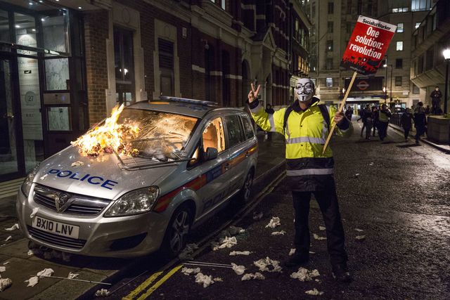 В центре Лондона проходит "Марш миллиона масок", фото AFP