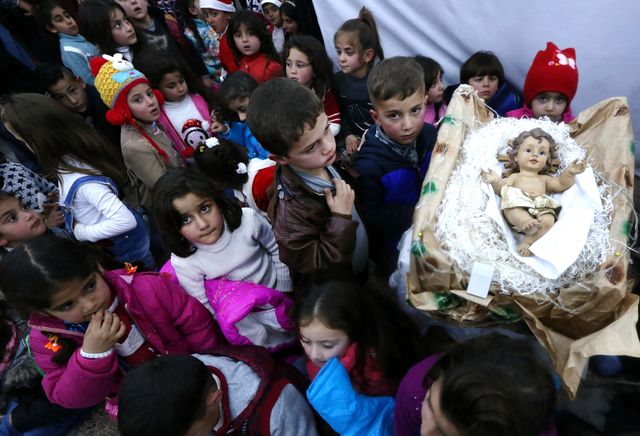 <p><span>Католики у всьому світі святкують Різдво. Фото: AFP</span></p>
