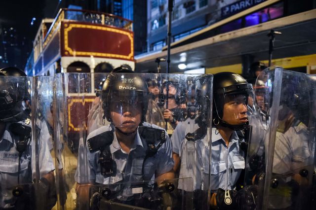 <p>Протести в Гонконзі: поліція застосувала перцевий газ, фото AFP</p>
