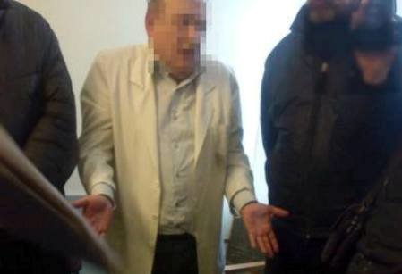 Во время задержания коррупционера. Фото: пресс-служба СБУ